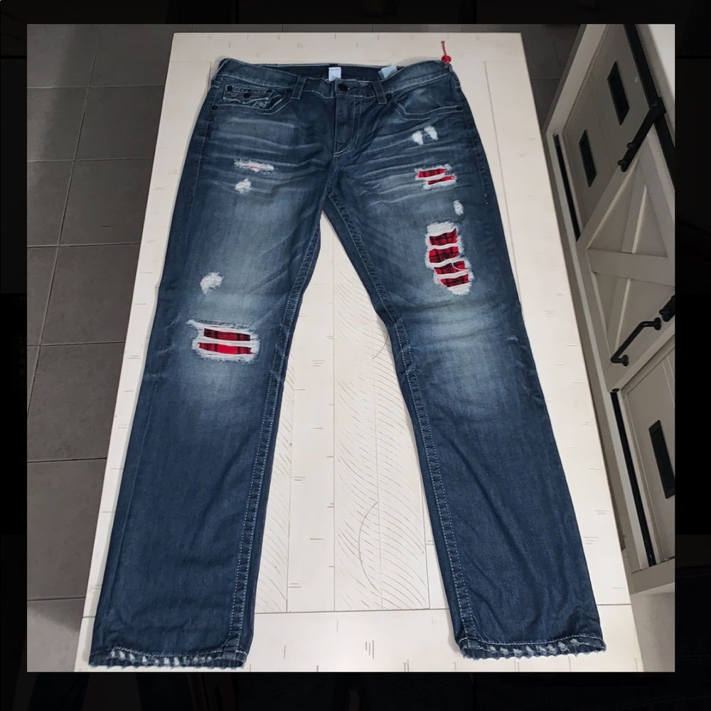 MENS TRUE RELIGION RIPPED JEANS